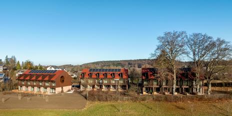 New build: mid-terrace house with private sunbathing island in an idyllic location and lake view