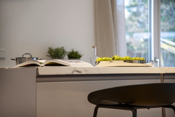 Stylish cooking island with subtle accents