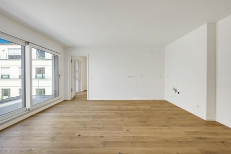 Neubau: Idealer Grundriss und Westausrichtung: Exklusive 3-Zimmer-Neubauwohnung mit Dachterrasse