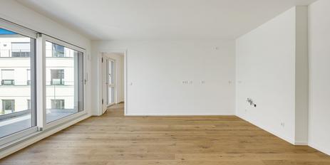 Neubau: Idealer Grundriss und Westausrichtung: Exklusive 3-Zimmer-Neubauwohnung mit Dachterrasse