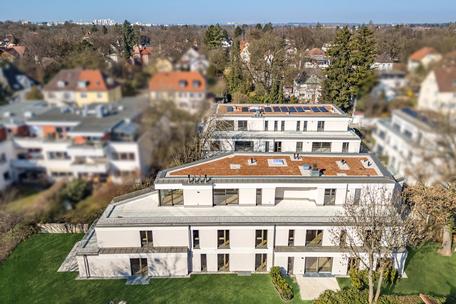 Neubau: Lichterfüllte 3-Zimmer-Wohnung mit Garten-Oase und Westausrichtung