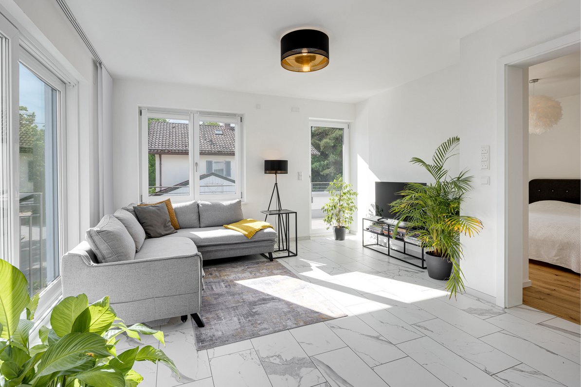 Light-filled living room with terrace access