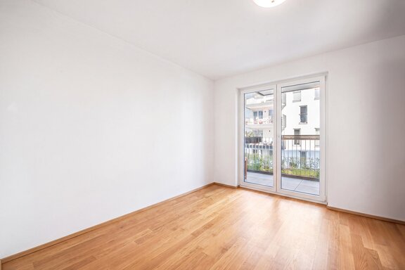 Bedroom with balcony access