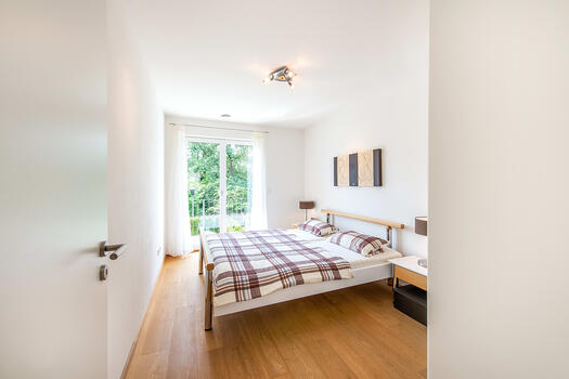 Bedroom with access to the balcony (upper floor)