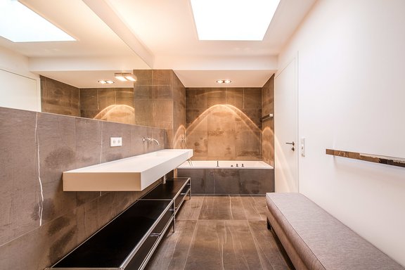 Master bathroom in dark marble