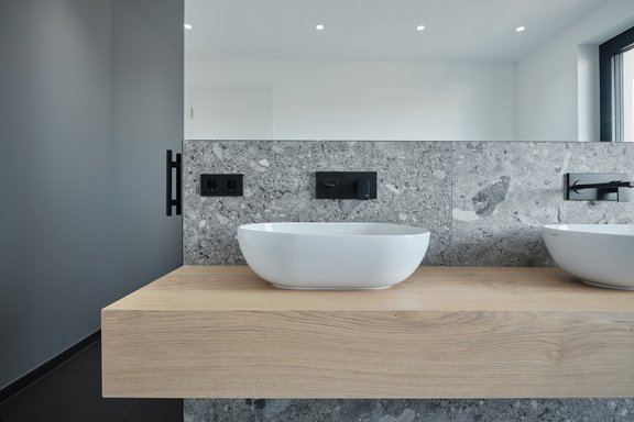Elegant bathroom with designer washbasin area