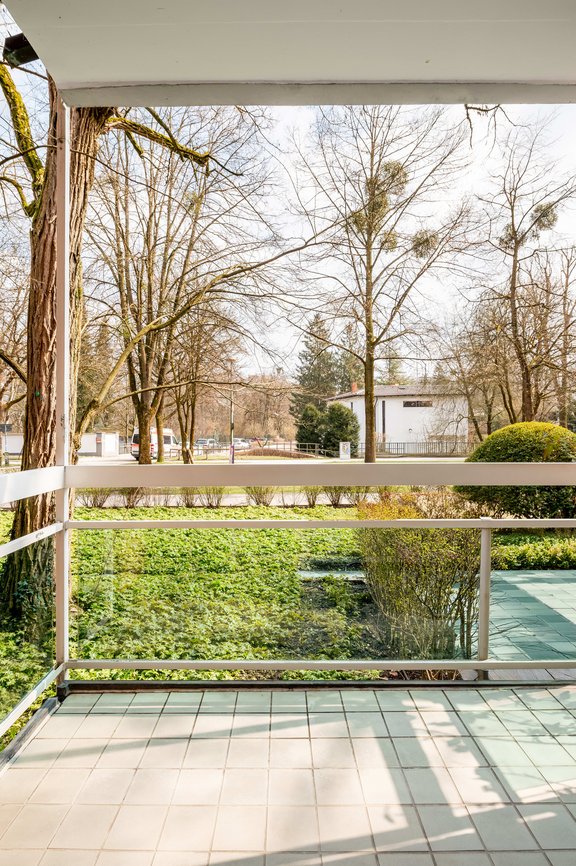 West-facing balcony with a view of the greenery