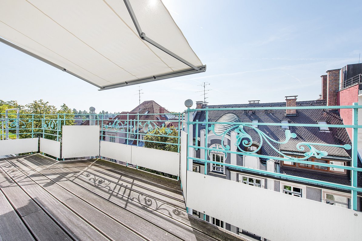 Roof terrace with electric awning