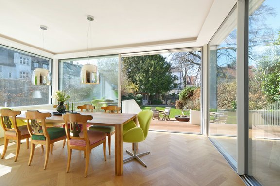 Modern conservatory extension with electric Skyframe windows