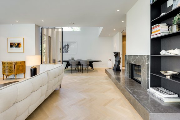 Adjacent to the living room is the dining area