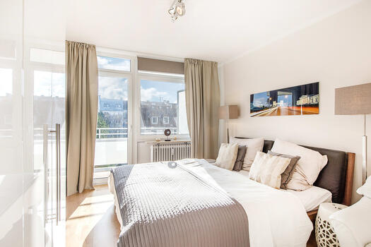 Bedroom with balcony access