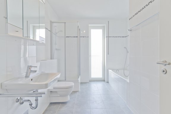 Bathroom with tub and shower