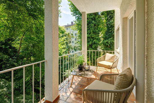 South balcony with a view of the greenery