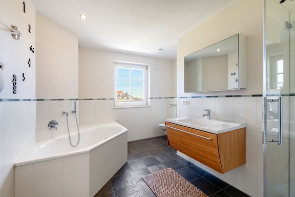 Children's bathroom with shower and bathtub