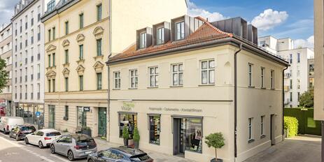 A renovated, historic Biedermeier house with a retail space and two residential units