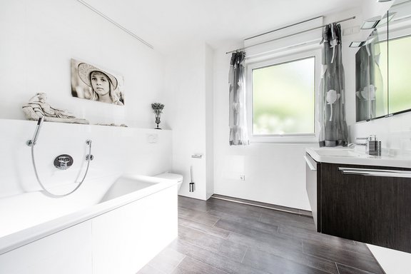 Master bath with mocha brown floor tiles