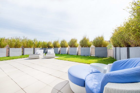 Spektakuläre Dachtterrasse mit immergrün Bambus