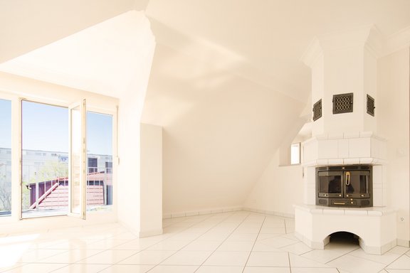 Living area with fireplace and south bay