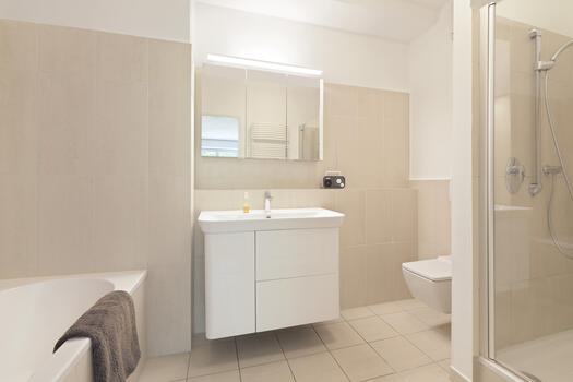 Bathroom with tub and shower