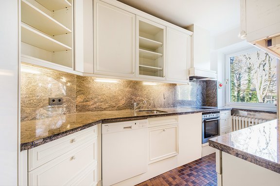 White fitted kitchen with pantry
