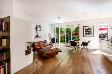 Sunny garden apartment with fireplace in quiet top location