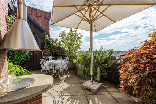 Roof terrace with outdoor fireplace