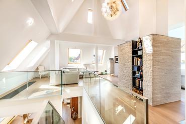 Spectacular top floor maisonette apartment with two loggias and fireplace at the English Garden