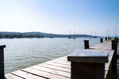 Einzigartiges Seegrundstück mit unverbaubarem Alpenblick und Privatsteg