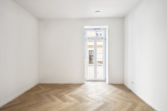 Bedroom with floor to ceiling window