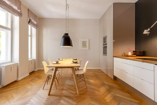 Bright cooking/dining area with open kitchen