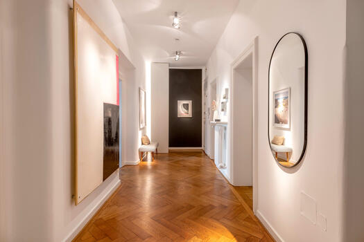 Spacious hallway with custom fixtures