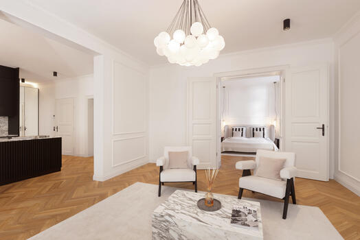 Herringbone parquet and stucco moldings