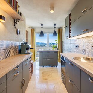 Cozy kitchen with a mountain view