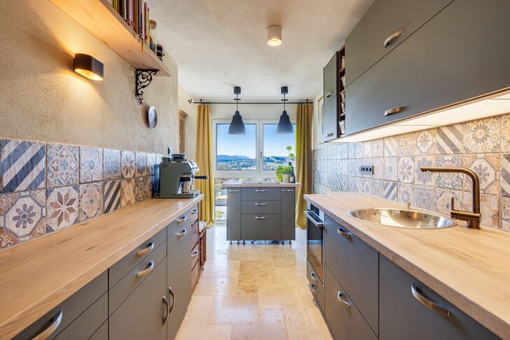 Cozy kitchen with a mountain view