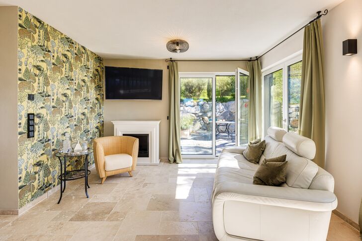 Living room with access to the patio