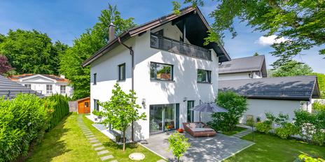 Modern single-family home with heat pump, four bedrooms, and sunny garden