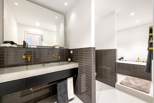 Bathroom with tub and shower