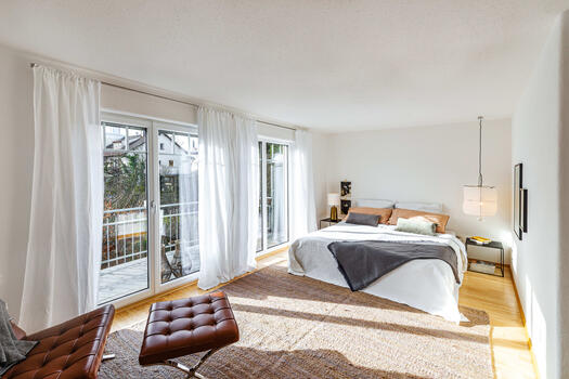 Room with large south-facing balcony