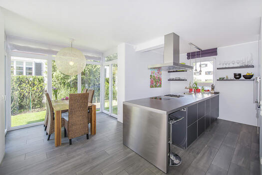 Open fitted kitchen and bay window