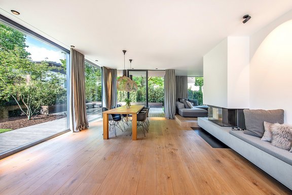 Open living / dining area with fireplace