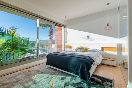 Schlafzimmer mit Balkon