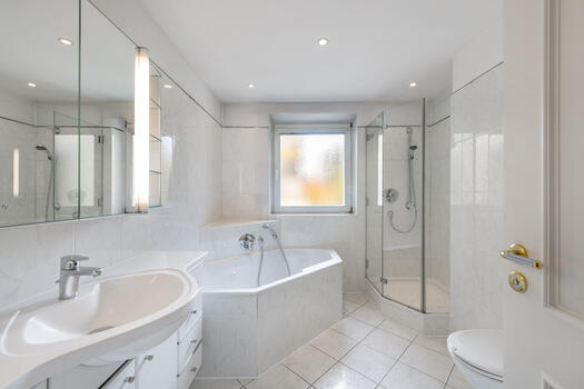 Spacious bathroom with window