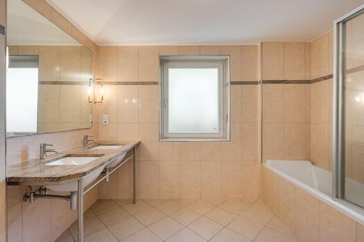 Spacious bathroom with natural light