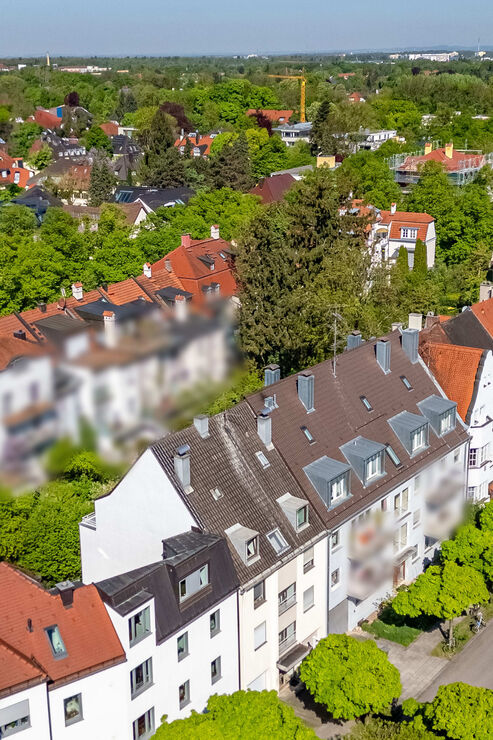 Mehrfamilienhaus mit Gartenfläche