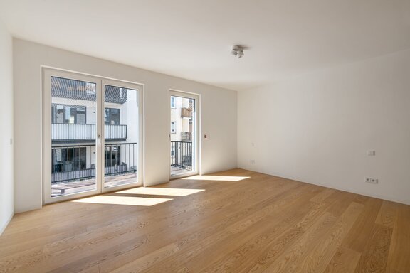 Bedroom with a south-facing balcony