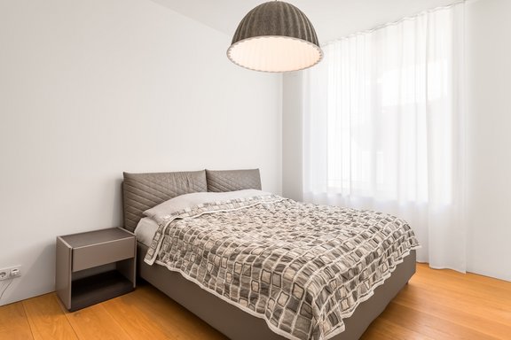 Master bedroom with access to the en suite bathroom