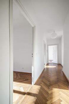 Typical of old buildings, the hallway provides access to all rooms