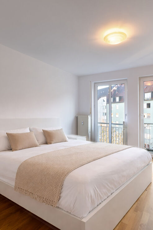 Schlafzimmer mit Balkon