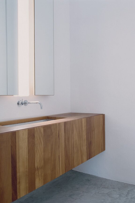 A bathroom featuring natural materials
