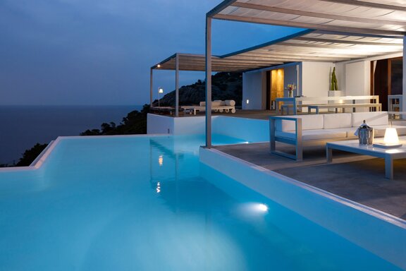 Infinity Pool Against an Atmospheric Evening Backdrop